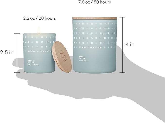 Skandinavisk ØY 'Island' Scented Candle. Fragrance Notes: Crabapple and Dog Rose, Water Mosses and Green Leaves. 7.0 oz.