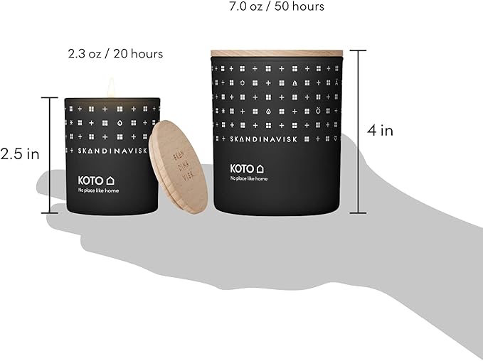 Skandinavisk KOTO 'Home' Scented Candle. Fragrance Notes: Vanilla Beans and Dried Orange Peel, Amber and Leather. 7.0 oz.