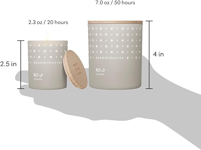 Skandinavisk RO 'Tranquility' Mini Scented Candle. Fragrance Notes: Cut Grass and Fallen Leaves, Cucumber and Wild Violets. 2.3 oz.