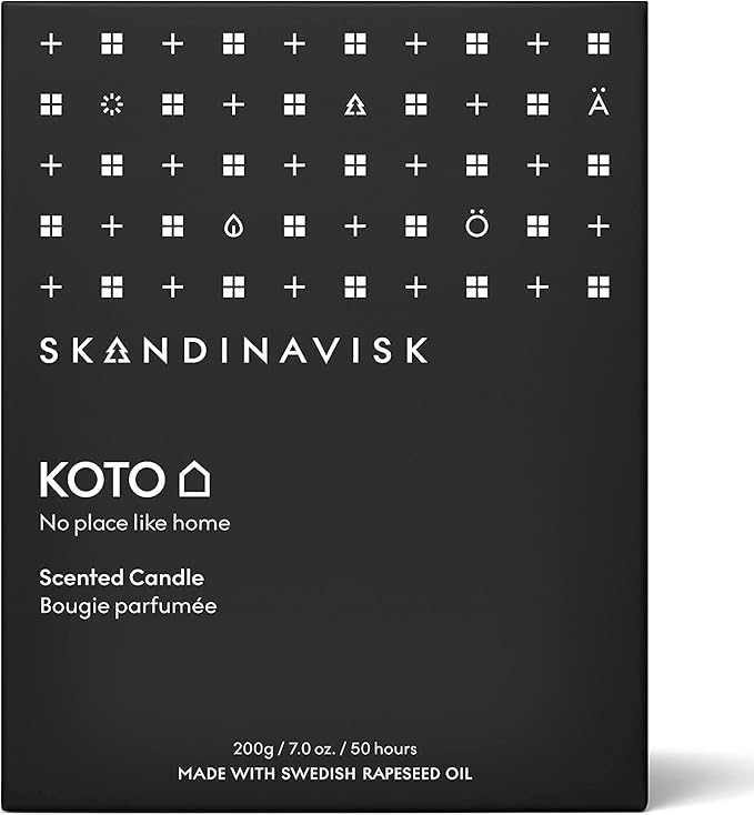 Skandinavisk KOTO 'Home' Scented Candle. Fragrance Notes: Vanilla Beans and Dried Orange Peel, Amber and Leather. 7.0 oz.