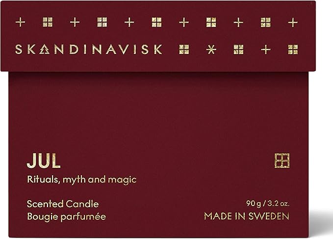 Skandinavisk JUL 'Christmas' Scented Candle. Fragrance Notes: Baked Gingerbread, Winter Cloves and Spiced Oranges. 3.17 oz.