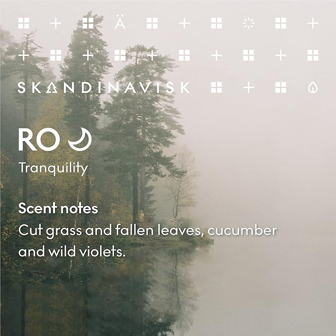 Skandinavisk RO 'Tranquility' Mini Scented Candle. Fragrance Notes: Cut Grass and Fallen Leaves, Cucumber and Wild Violets. 2.3 oz.