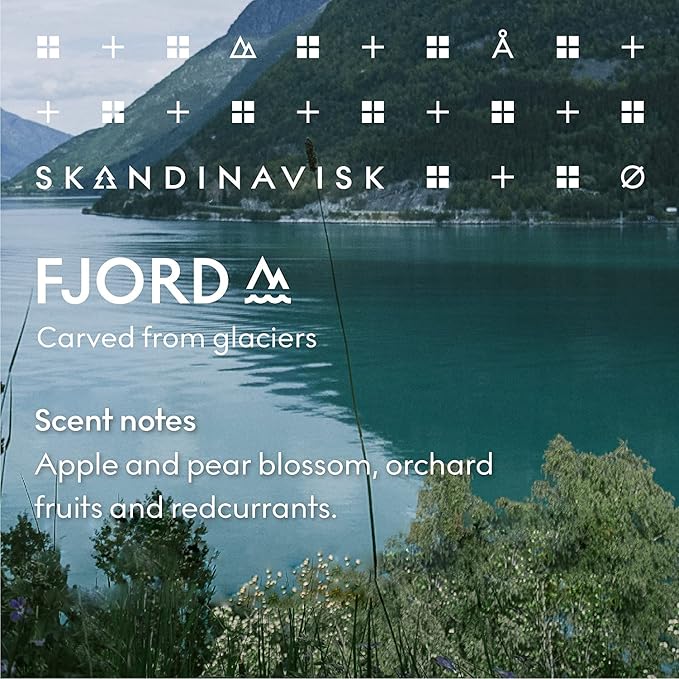 Skandinavisk Fjord Scented Candle. Fragrance Notes: Apple and Pear Blossom, Orchard Fruits and Redcurrants. 7.0 oz.