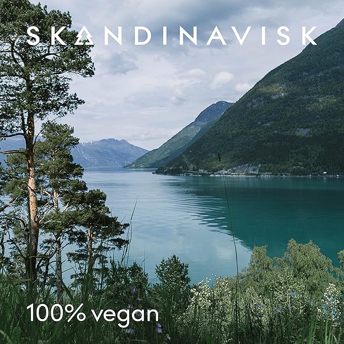 Skandinavisk KOTO 'Home' Scented Candle. Fragrance Notes: Vanilla Beans and Dried Orange Peel, Amber and Leather. 7.0 oz.